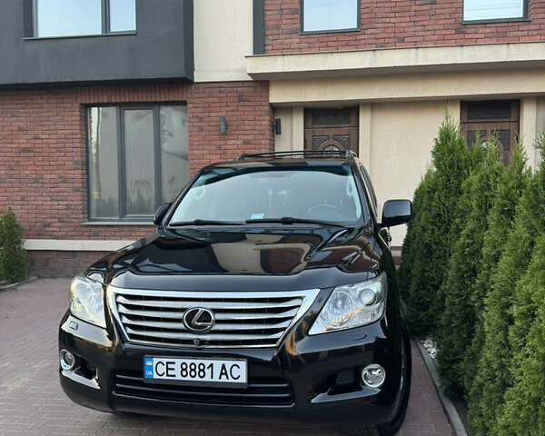 Черный Лексус ЛХ, объемом двигателя 5.66 л и пробегом 173 тыс. км за 32000 $, фото 4 на Automoto.ua