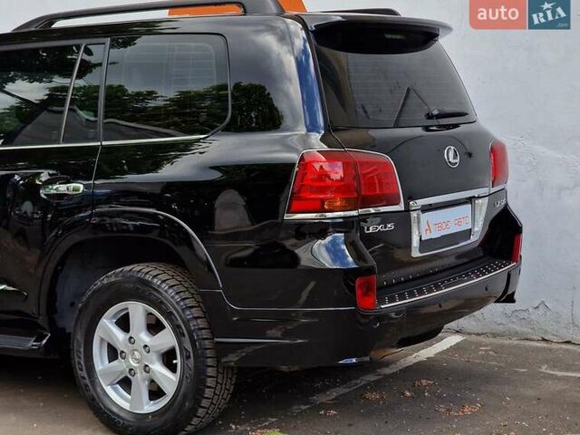 Черный Лексус ЛХ, объемом двигателя 5.66 л и пробегом 462 тыс. км за 21990 $, фото 18 на Automoto.ua