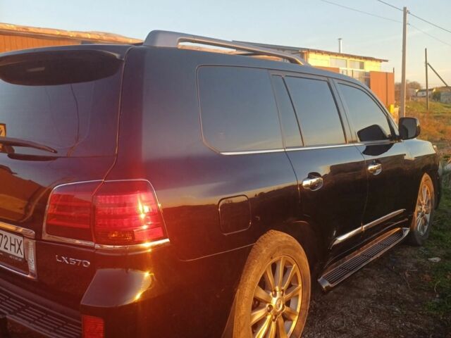 Черный Лексус ЛХ, объемом двигателя 5 л и пробегом 250 тыс. км за 23000 $, фото 3 на Automoto.ua
