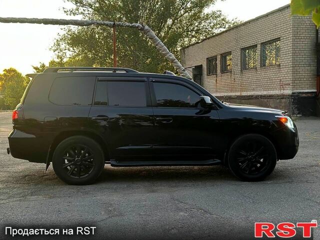 Черный Лексус ЛХ, объемом двигателя 5.7 л и пробегом 242 тыс. км за 20500 $, фото 2 на Automoto.ua