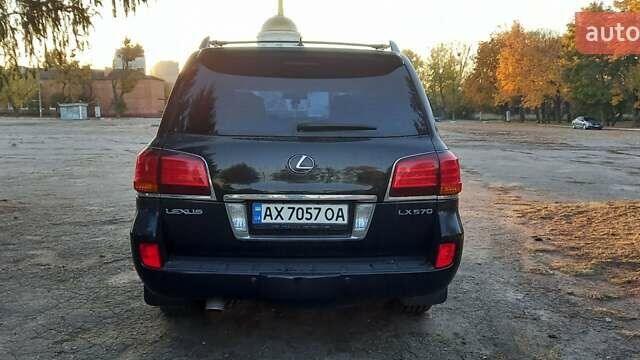Черный Лексус ЛХ, объемом двигателя 5.66 л и пробегом 237 тыс. км за 31000 $, фото 19 на Automoto.ua