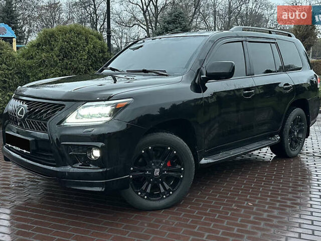 Чорний Лексус ЛХ, об'ємом двигуна 5.66 л та пробігом 262 тис. км за 18999 $, фото 1 на Automoto.ua