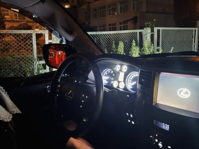 Черный Лексус ЛХ, объемом двигателя 5.7 л и пробегом 250 тыс. км за 27000 $, фото 12 на Automoto.ua