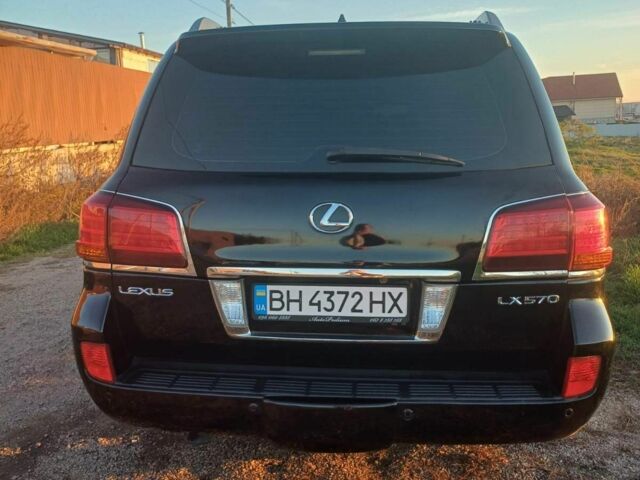 Черный Лексус ЛХ, объемом двигателя 5 л и пробегом 250 тыс. км за 23000 $, фото 1 на Automoto.ua