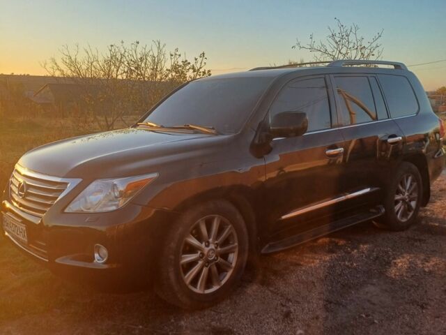 Черный Лексус ЛХ, объемом двигателя 5 л и пробегом 250 тыс. км за 23000 $, фото 5 на Automoto.ua