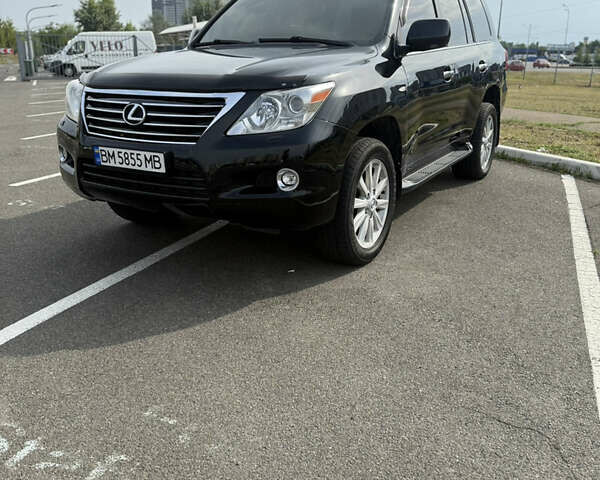 Черный Лексус ЛХ, объемом двигателя 5.66 л и пробегом 322 тыс. км за 21700 $, фото 2 на Automoto.ua