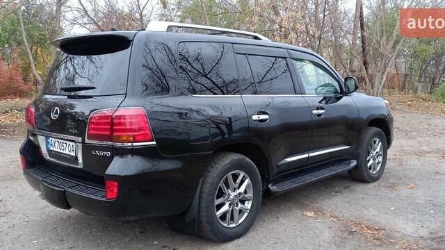 Черный Лексус ЛХ, объемом двигателя 5.66 л и пробегом 237 тыс. км за 31000 $, фото 10 на Automoto.ua