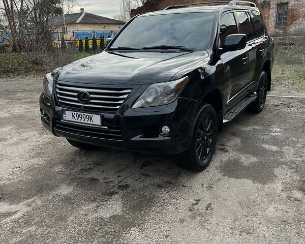 Черный Лексус ЛХ, объемом двигателя 5.66 л и пробегом 300 тыс. км за 24000 $, фото 1 на Automoto.ua