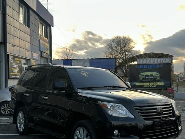Черный Лексус ЛХ, объемом двигателя 5.7 л и пробегом 306 тыс. км за 21500 $, фото 2 на Automoto.ua