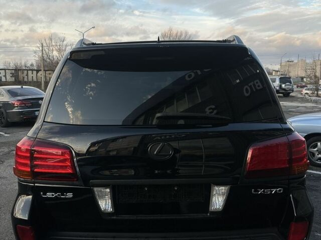 Черный Лексус ЛХ, объемом двигателя 5.7 л и пробегом 306 тыс. км за 21500 $, фото 5 на Automoto.ua