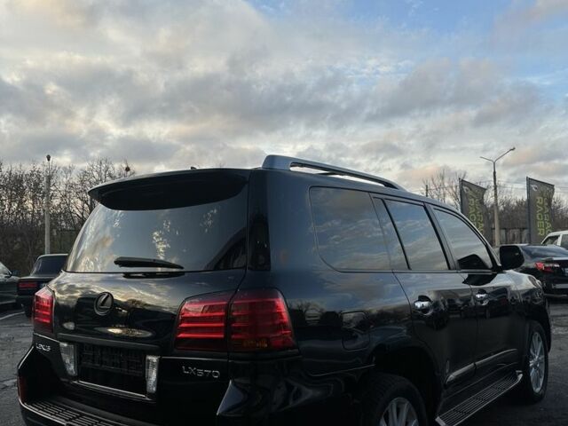 Черный Лексус ЛХ, объемом двигателя 5.7 л и пробегом 306 тыс. км за 21500 $, фото 4 на Automoto.ua