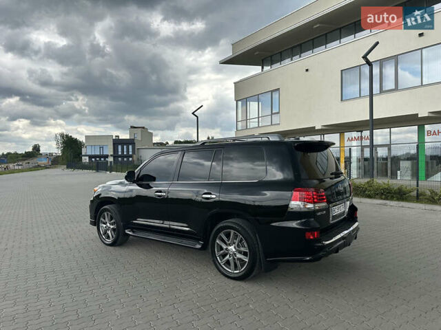 Чорний Лексус ЛХ, об'ємом двигуна 5.66 л та пробігом 148 тис. км за 27700 $, фото 1 на Automoto.ua