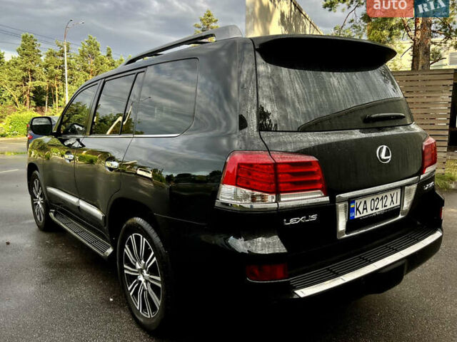 Черный Лексус ЛХ, объемом двигателя 5.66 л и пробегом 300 тыс. км за 27500 $, фото 2 на Automoto.ua
