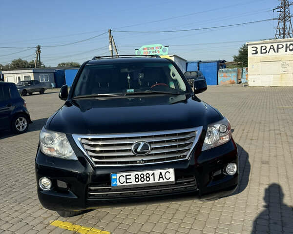 Черный Лексус ЛХ, объемом двигателя 5.66 л и пробегом 173 тыс. км за 32000 $, фото 3 на Automoto.ua