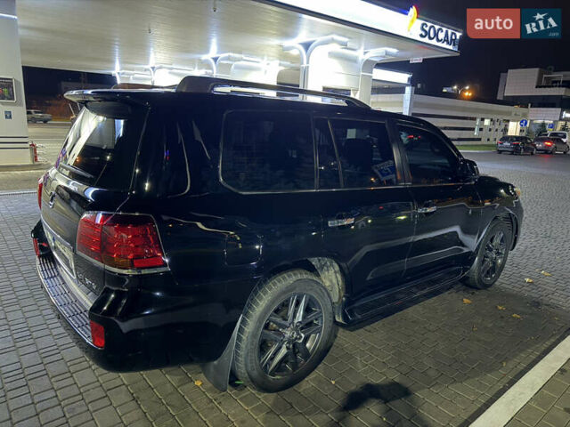 Черный Лексус ЛХ, объемом двигателя 5.7 л и пробегом 267 тыс. км за 23800 $, фото 5 на Automoto.ua