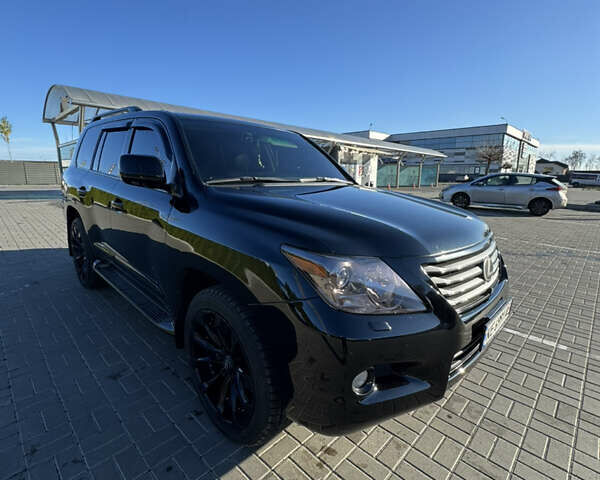 Черный Лексус ЛХ, объемом двигателя 5.7 л и пробегом 218 тыс. км за 26200 $, фото 1 на Automoto.ua