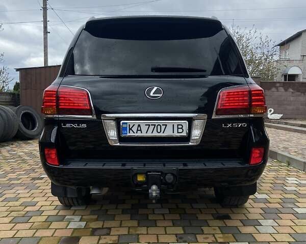 Черный Лексус ЛХ, объемом двигателя 5.66 л и пробегом 160 тыс. км за 28000 $, фото 4 на Automoto.ua