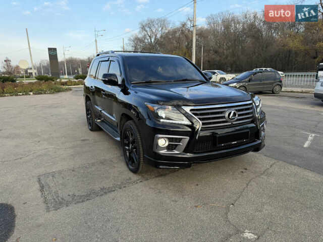 Черный Лексус ЛХ, объемом двигателя 5.66 л и пробегом 160 тыс. км за 38000 $, фото 4 на Automoto.ua