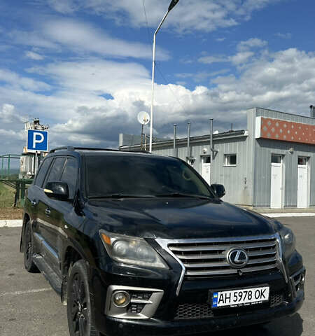 Черный Лексус ЛХ, объемом двигателя 5.66 л и пробегом 320 тыс. км за 33000 $, фото 1 на Automoto.ua