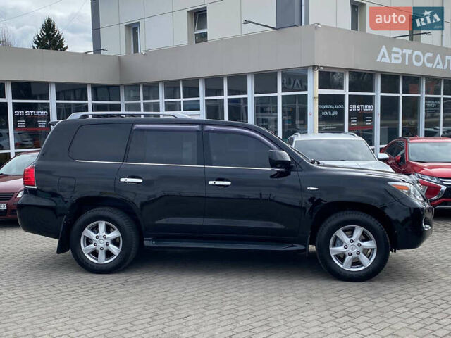 Черный Лексус ЛХ, объемом двигателя 5.66 л и пробегом 310 тыс. км за 25500 $, фото 3 на Automoto.ua