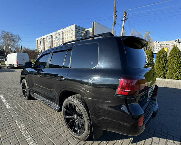 Черный Лексус ЛХ, объемом двигателя 5.7 л и пробегом 218 тыс. км за 26200 $, фото 3 на Automoto.ua