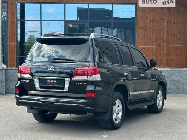 Черный Лексус ЛХ, объемом двигателя 5.66 л и пробегом 168 тыс. км за 75900 $, фото 3 на Automoto.ua