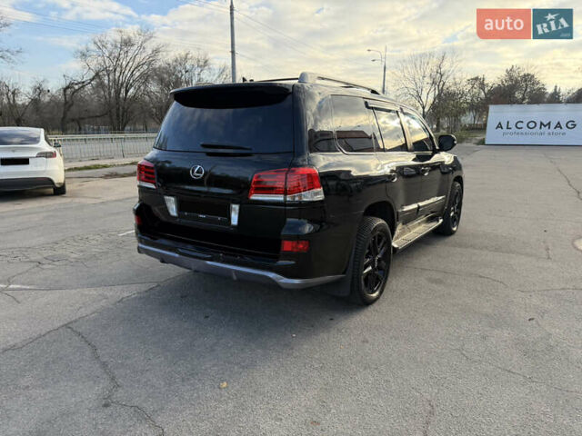 Черный Лексус ЛХ, объемом двигателя 5.66 л и пробегом 160 тыс. км за 38000 $, фото 11 на Automoto.ua