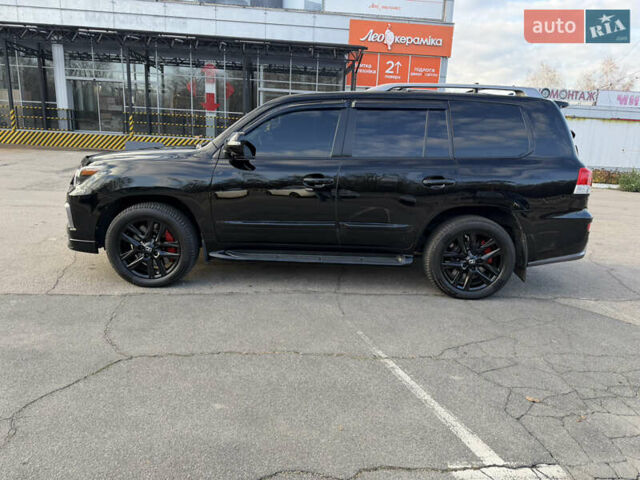 Черный Лексус ЛХ, объемом двигателя 5.66 л и пробегом 160 тыс. км за 38000 $, фото 13 на Automoto.ua