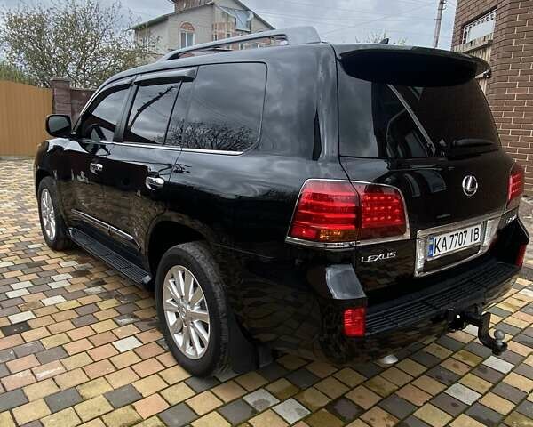 Черный Лексус ЛХ, объемом двигателя 5.66 л и пробегом 160 тыс. км за 28000 $, фото 5 на Automoto.ua