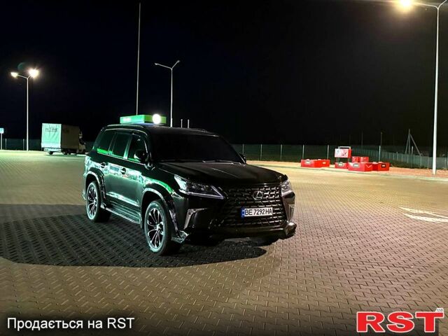 Черный Лексус ЛХ, объемом двигателя 5.7 л и пробегом 195 тыс. км за 35700 $, фото 2 на Automoto.ua