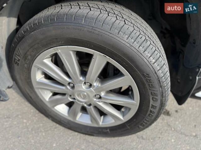 Черный Лексус ЛХ, объемом двигателя 5.66 л и пробегом 374 тыс. км за 26500 $, фото 4 на Automoto.ua