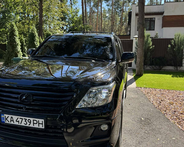 Черный Лексус ЛХ, объемом двигателя 5.66 л и пробегом 113 тыс. км за 38500 $, фото 2 на Automoto.ua