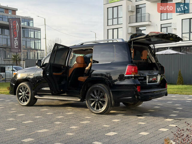 Черный Лексус ЛХ, объемом двигателя 5.7 л и пробегом 443 тыс. км за 26800 $, фото 72 на Automoto.ua