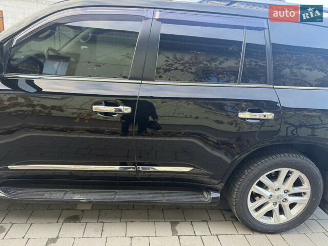 Черный Лексус ЛХ, объемом двигателя 5.66 л и пробегом 288 тыс. км за 29300 $, фото 4 на Automoto.ua