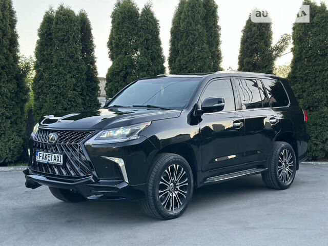 Черный Лексус ЛХ, объемом двигателя 5.7 л и пробегом 210 тыс. км за 40000 $, фото 2 на Automoto.ua