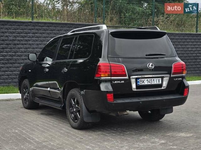 Черный Лексус ЛХ, объемом двигателя 5.66 л и пробегом 238 тыс. км за 25700 $, фото 2 на Automoto.ua