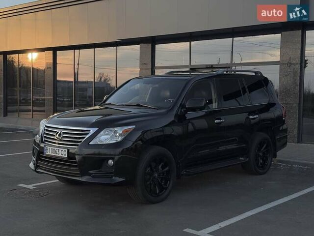 Черный Лексус ЛХ, объемом двигателя 5.66 л и пробегом 246 тыс. км за 31000 $, фото 1 на Automoto.ua