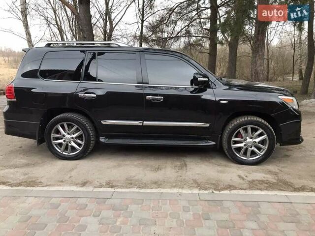 Черный Лексус ЛХ, объемом двигателя 5.7 л и пробегом 197 тыс. км за 39000 $, фото 1 на Automoto.ua