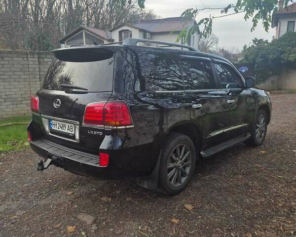 Черный Лексус ЛХ, объемом двигателя 5.66 л и пробегом 220 тыс. км за 29500 $, фото 6 на Automoto.ua