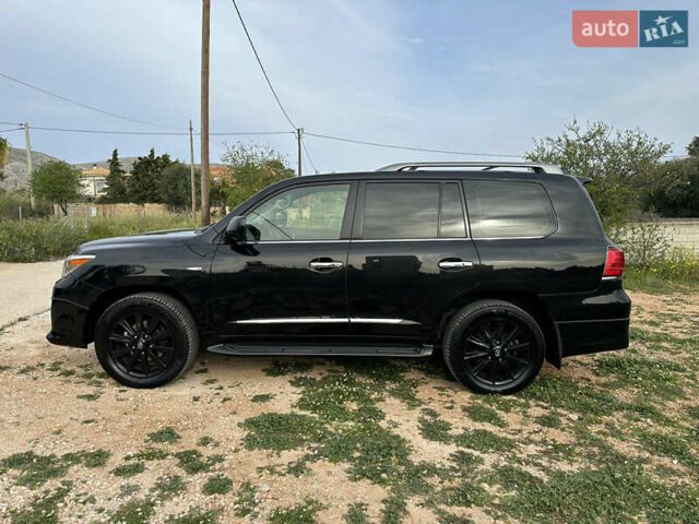 Черный Лексус ЛХ, объемом двигателя 5.66 л и пробегом 151 тыс. км за 39500 $, фото 8 на Automoto.ua