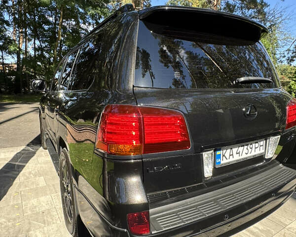 Черный Лексус ЛХ, объемом двигателя 5.66 л и пробегом 113 тыс. км за 38500 $, фото 7 на Automoto.ua