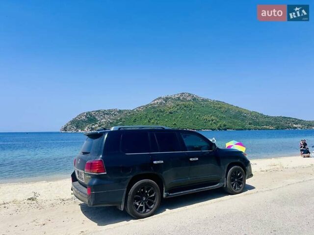 Черный Лексус ЛХ, объемом двигателя 5.66 л и пробегом 246 тыс. км за 31000 $, фото 11 на Automoto.ua