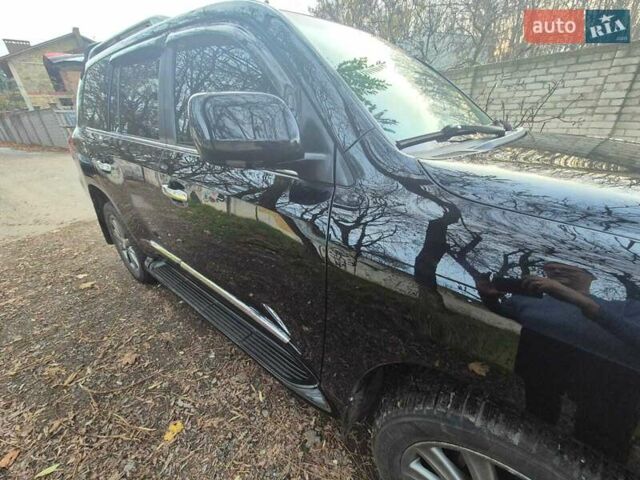 Черный Лексус ЛХ, объемом двигателя 5.66 л и пробегом 220 тыс. км за 29500 $, фото 21 на Automoto.ua