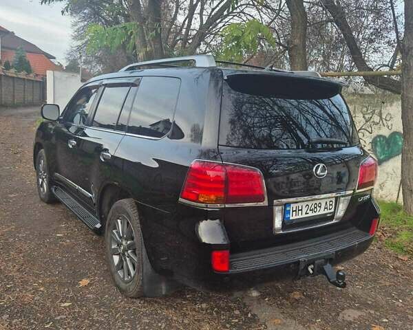 Черный Лексус ЛХ, объемом двигателя 5.66 л и пробегом 220 тыс. км за 29500 $, фото 4 на Automoto.ua