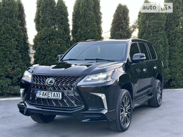 Черный Лексус ЛХ, объемом двигателя 5.7 л и пробегом 210 тыс. км за 40000 $, фото 1 на Automoto.ua