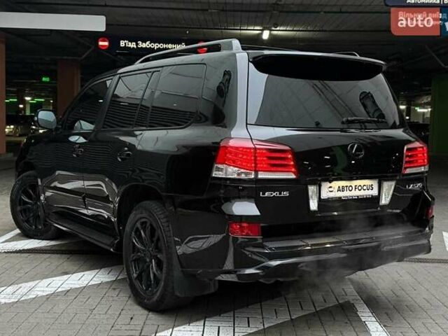 Черный Лексус ЛХ, объемом двигателя 5.66 л и пробегом 285 тыс. км за 34990 $, фото 4 на Automoto.ua