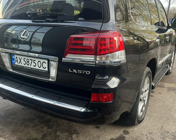 Чорний Лексус ЛХ, об'ємом двигуна 5.66 л та пробігом 214 тис. км за 38500 $, фото 1 на Automoto.ua