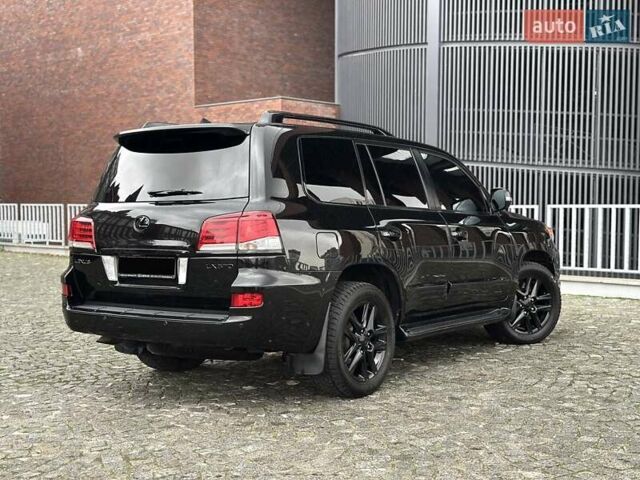 Черный Лексус ЛХ, объемом двигателя 5.66 л и пробегом 79 тыс. км за 42500 $, фото 13 на Automoto.ua