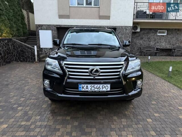 Черный Лексус ЛХ, объемом двигателя 5.66 л и пробегом 238 тыс. км за 34900 $, фото 1 на Automoto.ua