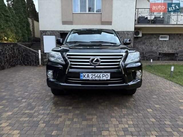 Черный Лексус ЛХ, объемом двигателя 5.66 л и пробегом 238 тыс. км за 34900 $, фото 2 на Automoto.ua